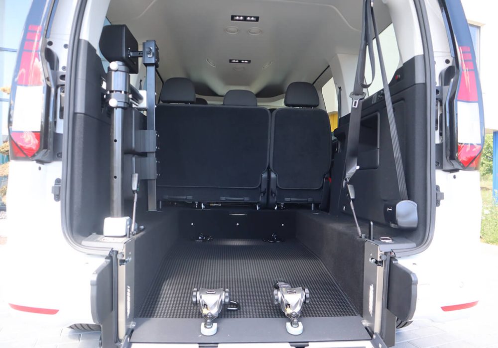 Caddy Maxi TPMR Blanc vue arrière intérieur du décaissement - minibus handicap